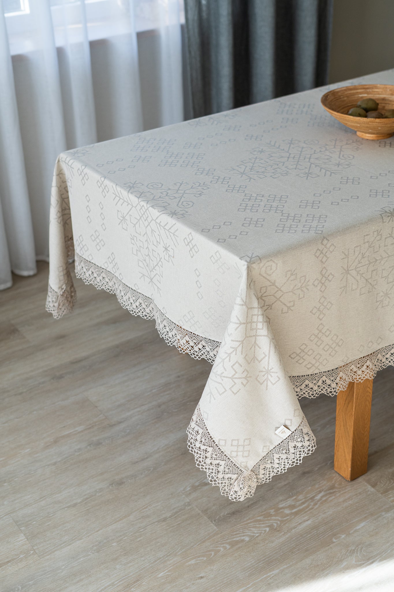 Linen and cotton natural tablecloth with Austra tree pattern and Latvian Power symbols