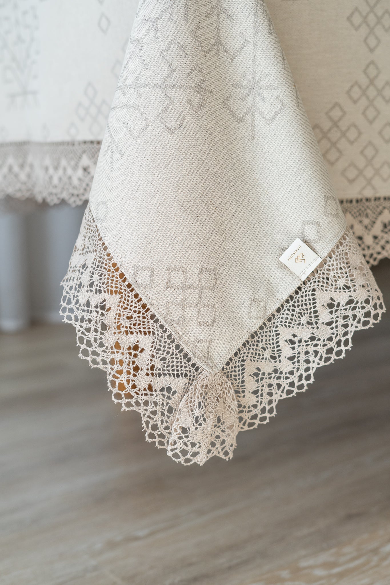 Linen and cotton natural tablecloth with Austra tree pattern and Latvian Power symbols