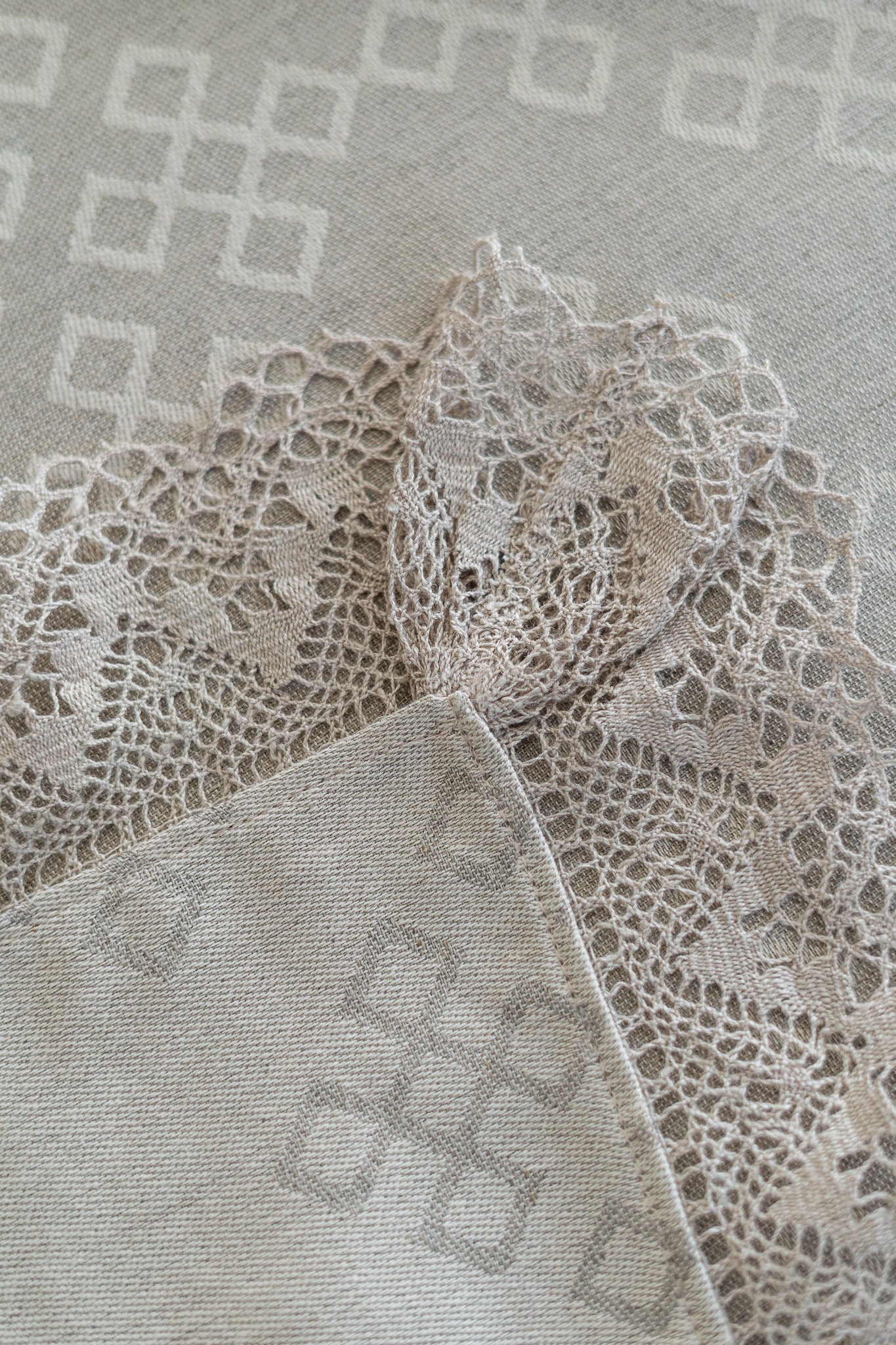 Linen and cotton natural tablecloth with Austra tree pattern and Latvian Power symbols