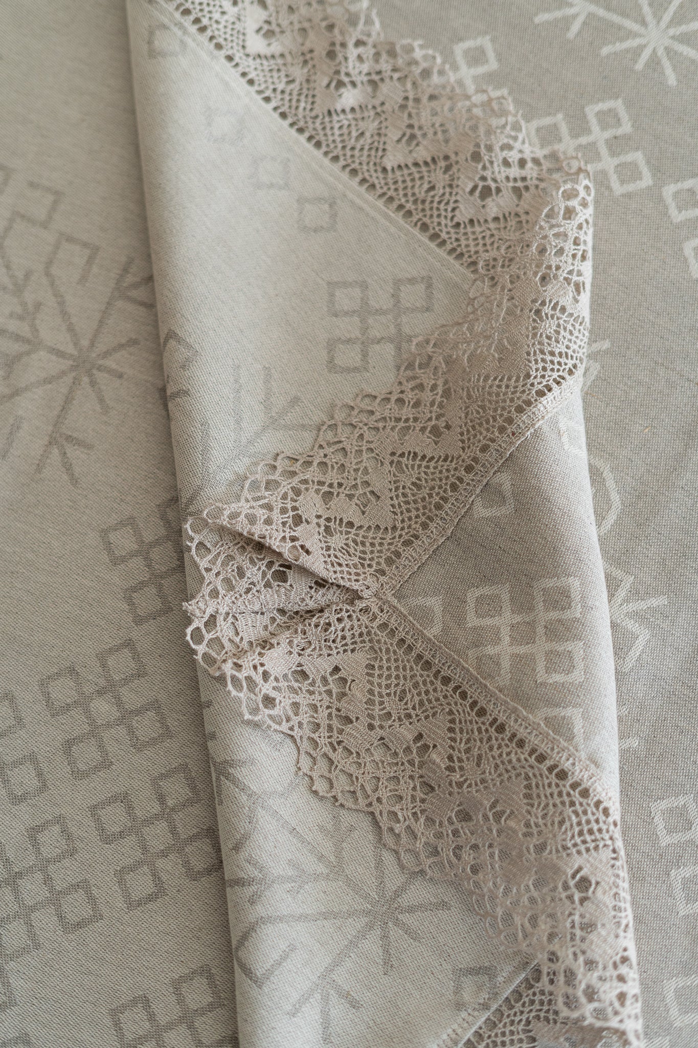 Linen and cotton natural tablecloth with Austra tree pattern and Latvian Power symbols