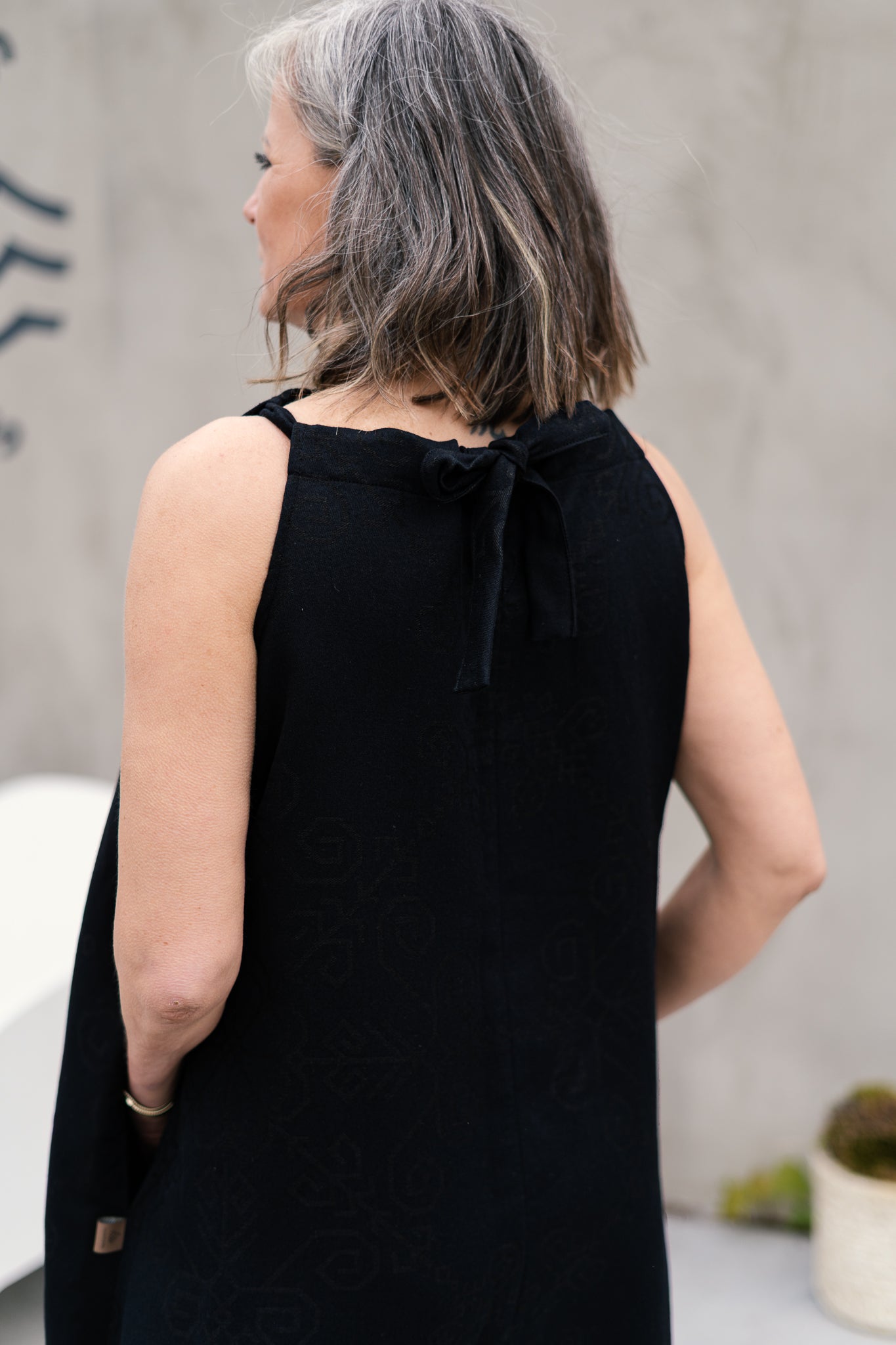 Linen Dress with Sun Symbol PLŪSTOŠĀ DZELME Flared, black