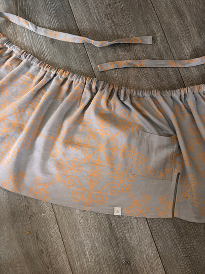 Vīriešu pirts svārki ar Saules simbolu, latviešu un baltu zīmēm pirtniekiem pirts rituālos